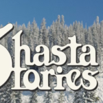 Snow covered trees and ski chair lift in background with blue sky and the words "Shasta Stories" in the foreground