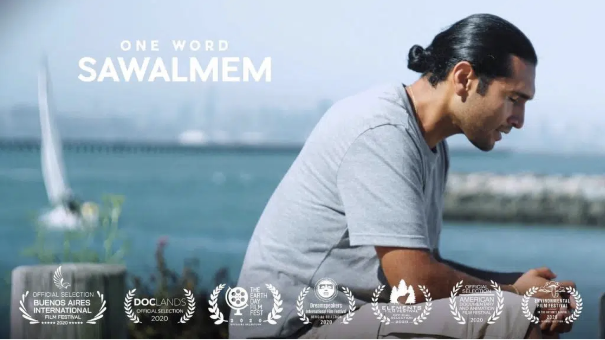 One Word Sawalmem movie title on out of focus background of San Francisco Bay with Michael 